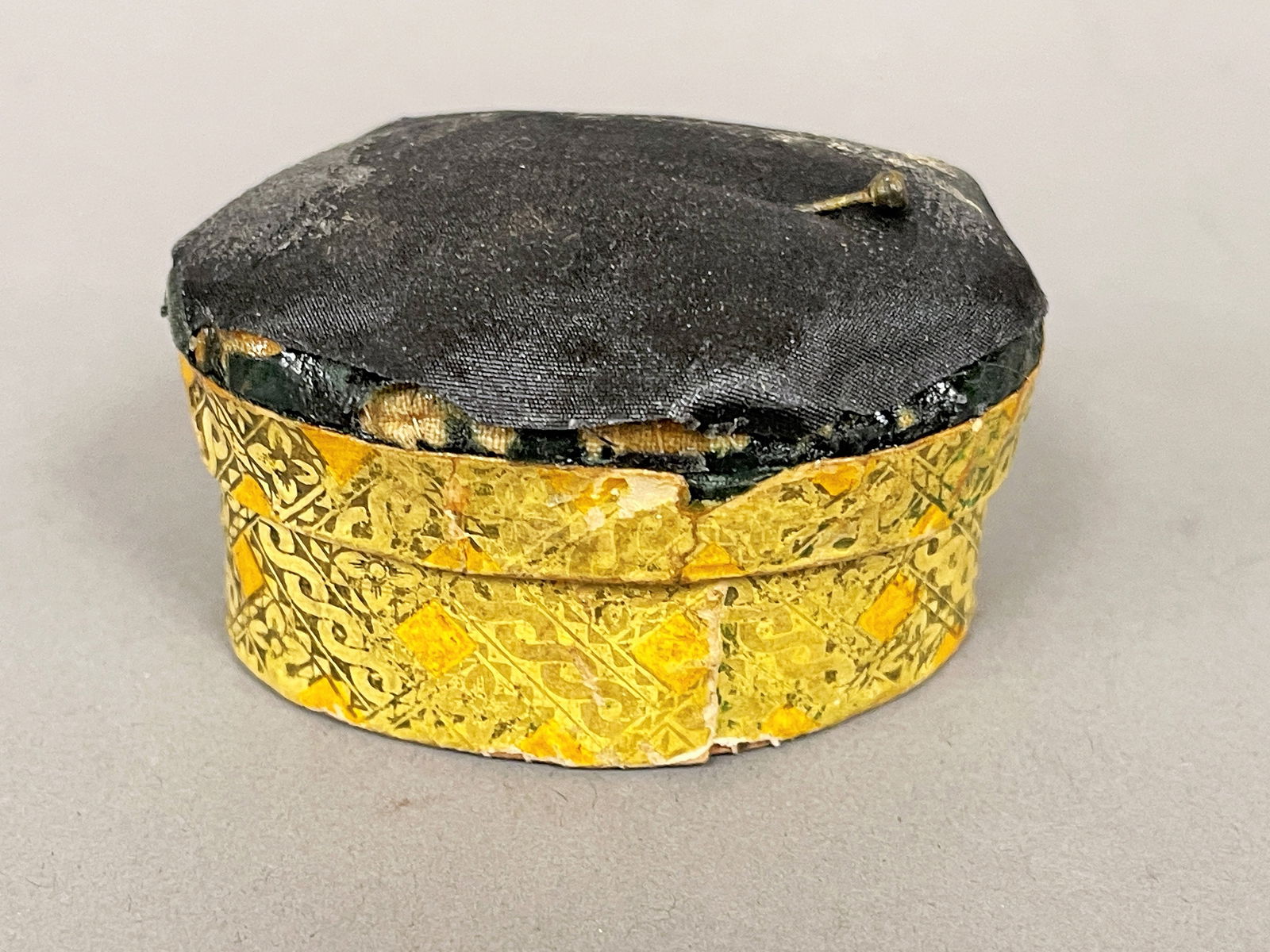 19TH C MINI PRINT ORANGE AND BROWN WITH GREEN WOOL DOME TOP PIN CUSHION (1 of 6)