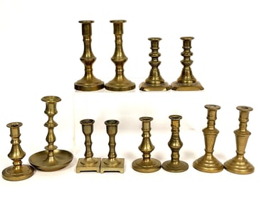 GROUPING OF DIMINUTIVE BRASS CANDLESTICKS
