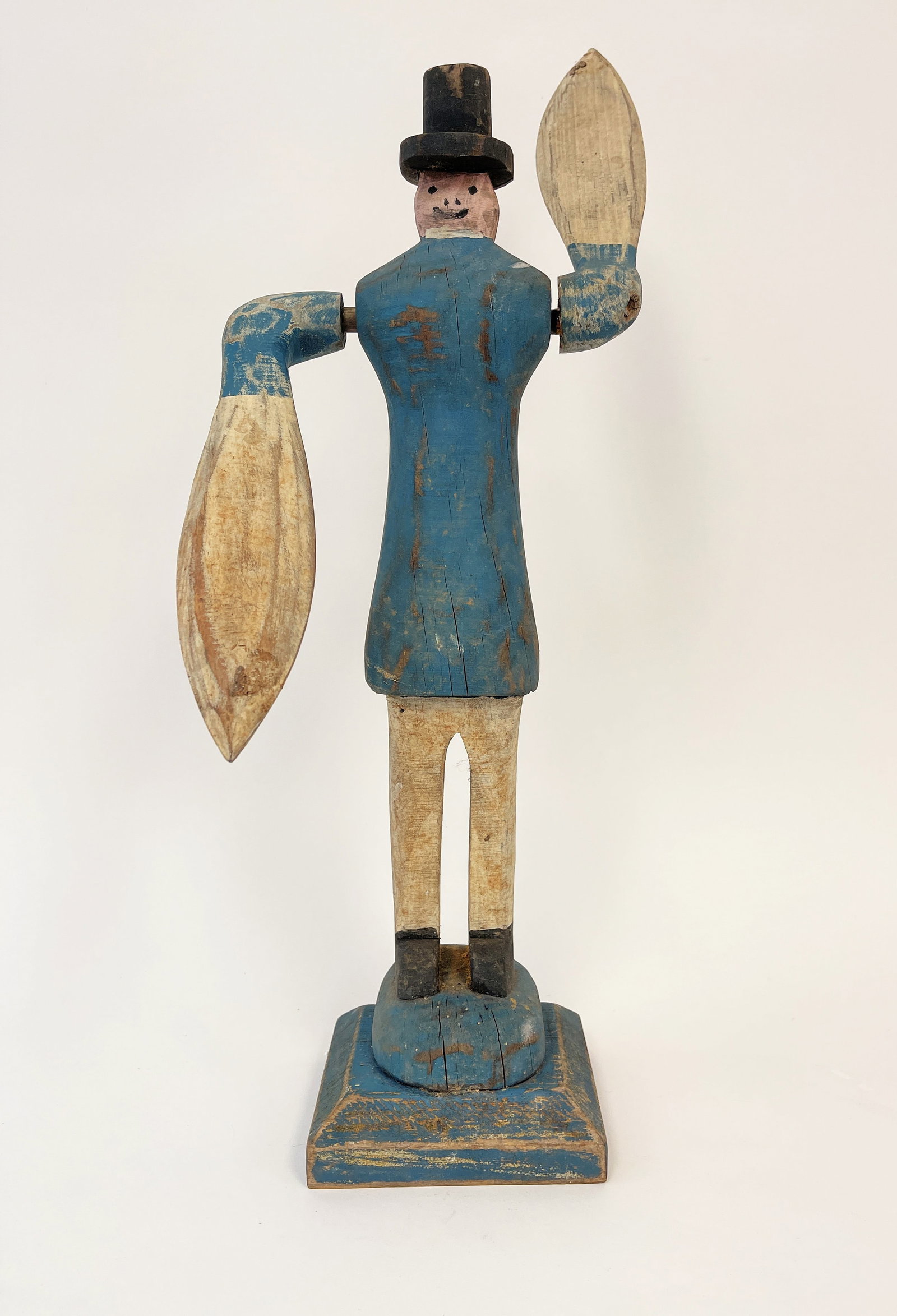 FOLK ART PAINTED WOODEN WHIRLIGIG: FOLK ART PAINTED WOODEN WHIRLIGIG OF A MAN IN TOP HAT, 18"