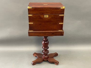 19THC BRASS BOUND CAMPAIGN CHEST ON CENTER PEDESTAL FRAME WITH DECANTERS