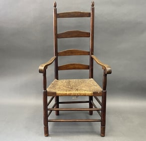 EARLY LADDER BACK ARM CHAIR