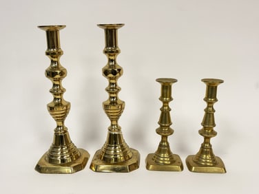 TWO PAIRS BRASS PUSH UP CANDLESTICKS