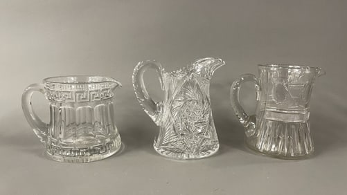 GROUPING OF THREE LEADED GLASS PITCHERS ONE MARKED HEISY