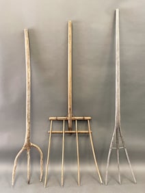 GROUPING OF THREE PRIMITIVE HAY FORKS