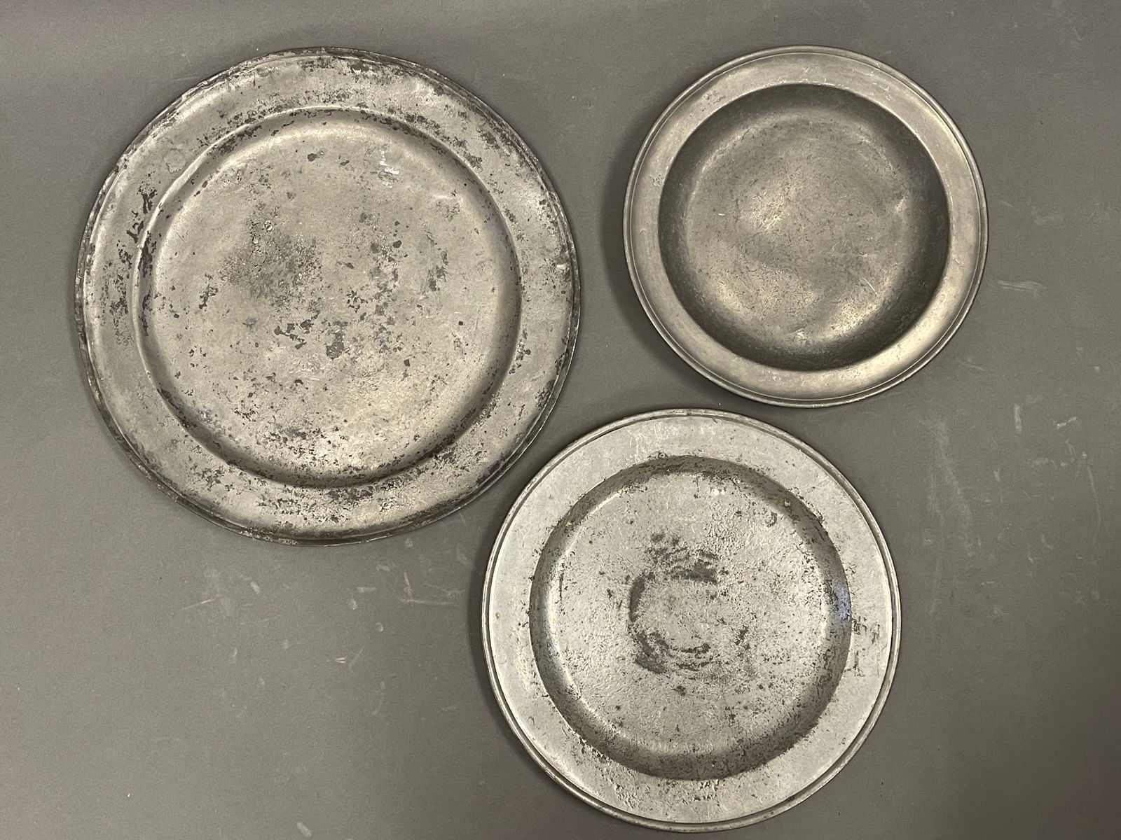 A LOT OF 3 18TH C PEWTER CHARGERS (1 of 3)