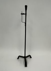 18TH C WROUGHT IRON CANDLE HOLDER IN OLD BLACK PAINT