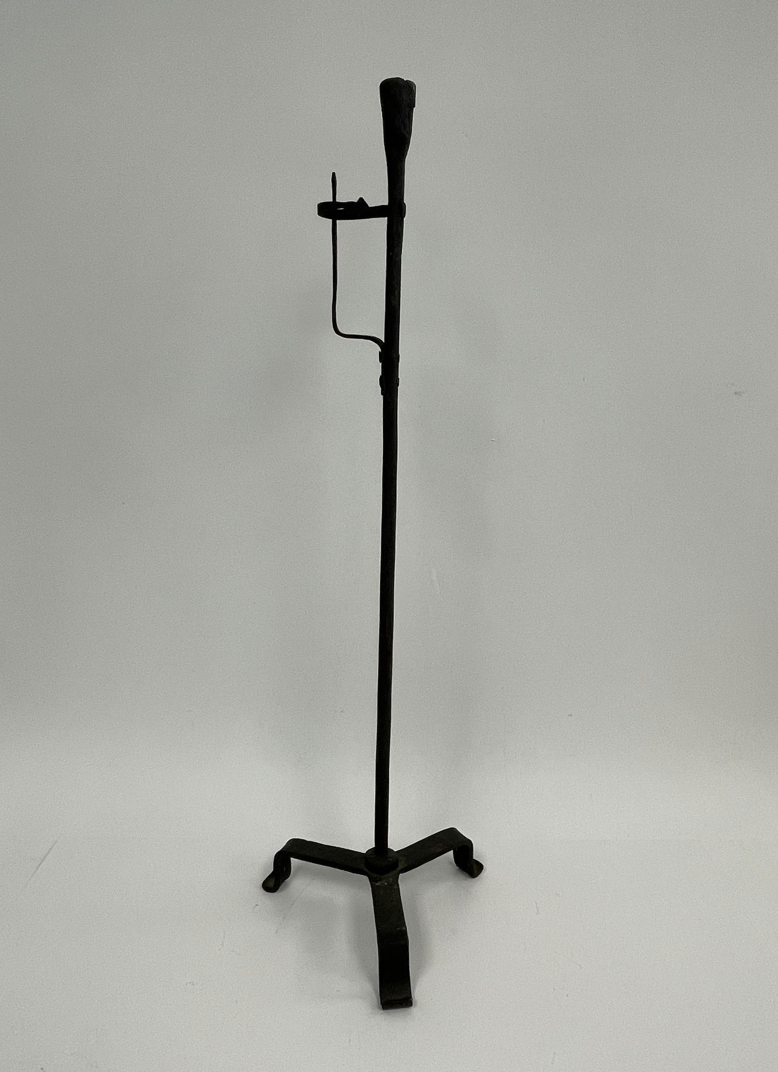18TH C WROUGHT IRON CANDLE HOLDER IN OLD BLACK PAINT (1 of 4)