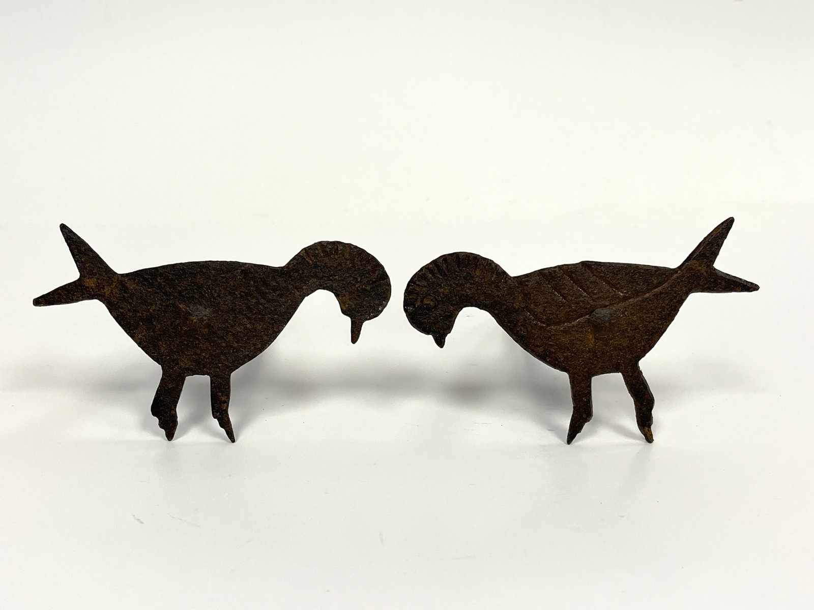 PAIR FORGED IRON STICKING TOMMYS: PAIR FORGED IRON STICKING TOMMYS WITH BIRD DECORATION 6 X 5