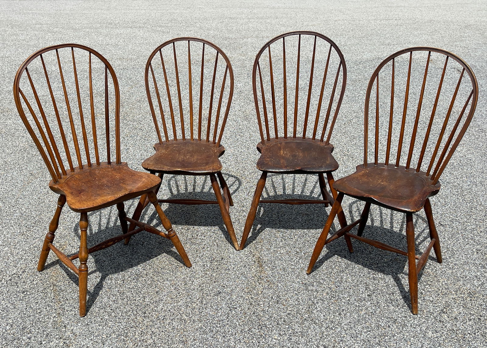 A SET OF 4 SEVEN SPINDLE BOW BACK WINDSOR CHAIRS (1 of 3)