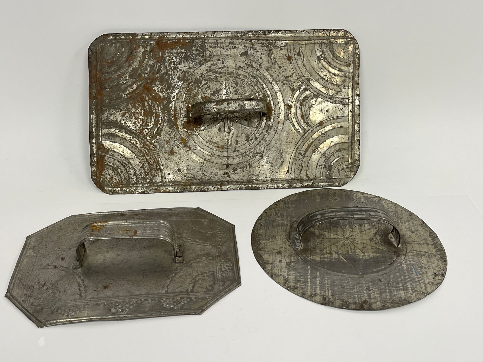 3 SHEET TIN POT LIDS W/EMBOSSED DESIGNS (1 of 2)