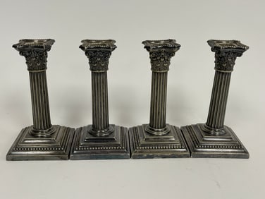 FOUR NEOCLASSICAL CANDLESTICKS