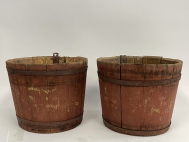 TWO RED PAINTED SAP BUCKETS