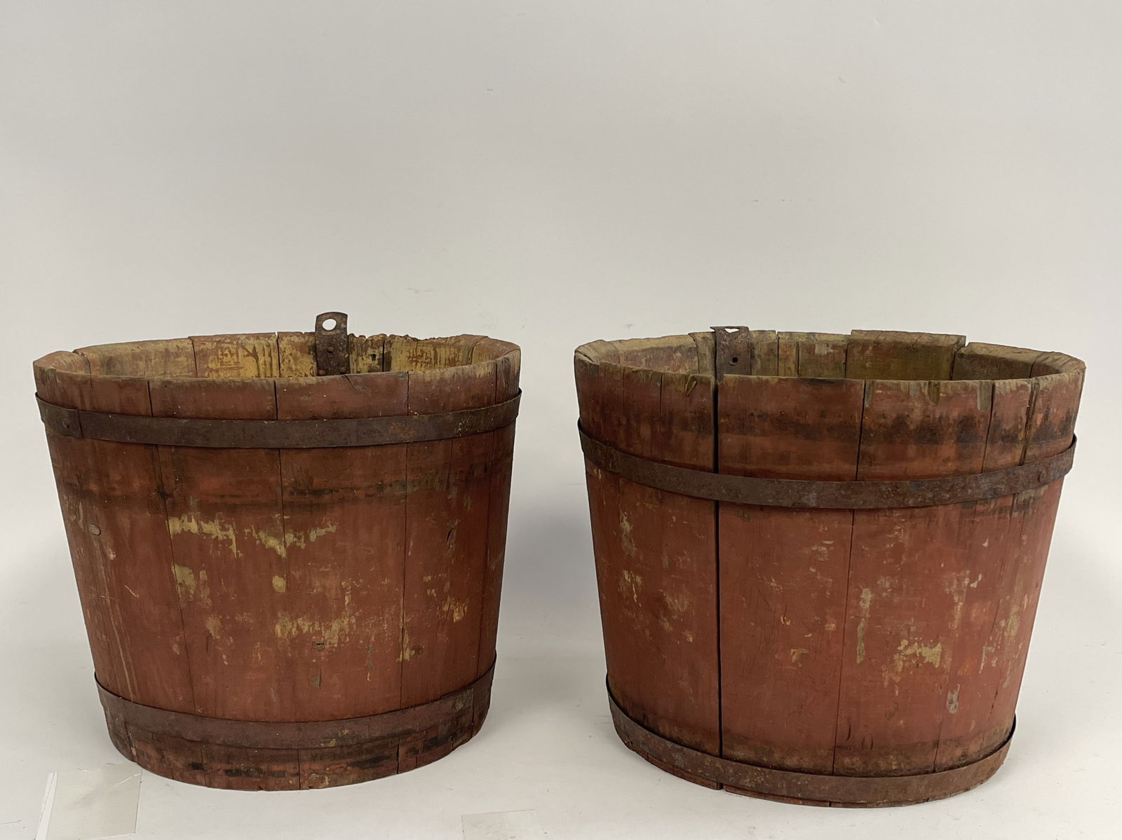 TWO RED PAINTED SAP BUCKETS (1 of 2)