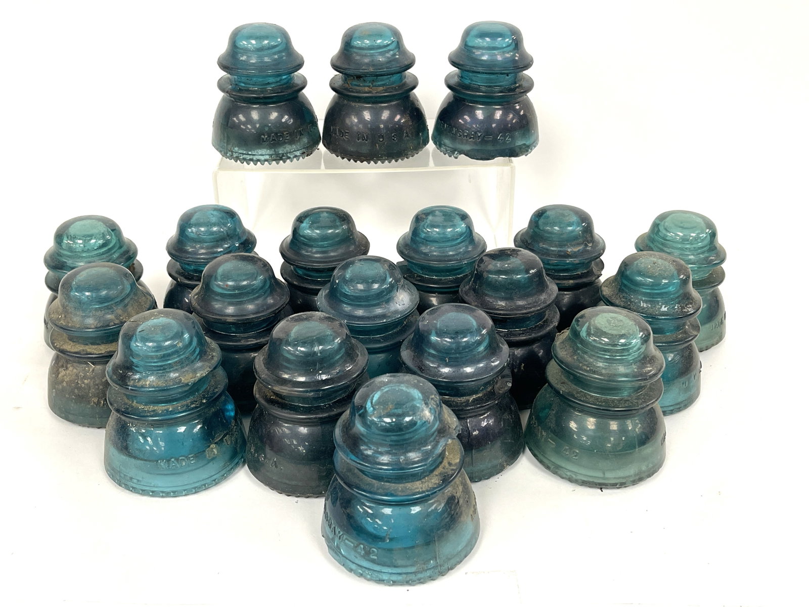 GROUPING OF BLUE GLASS INSULATORS: GROUPING OF BLUE GLASS INSULATORS, AS FOUND