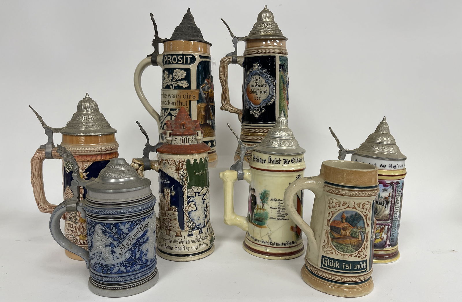 GROUPING OF EIGHT MISC GERMAN STEINS (1 of 4)