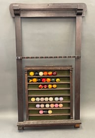 TWO BILLIARD RACKS AND POOL BALLS