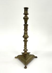 17TH C DUTCH BRASS TALL TRIFID-HOOFED CANDLESTICK