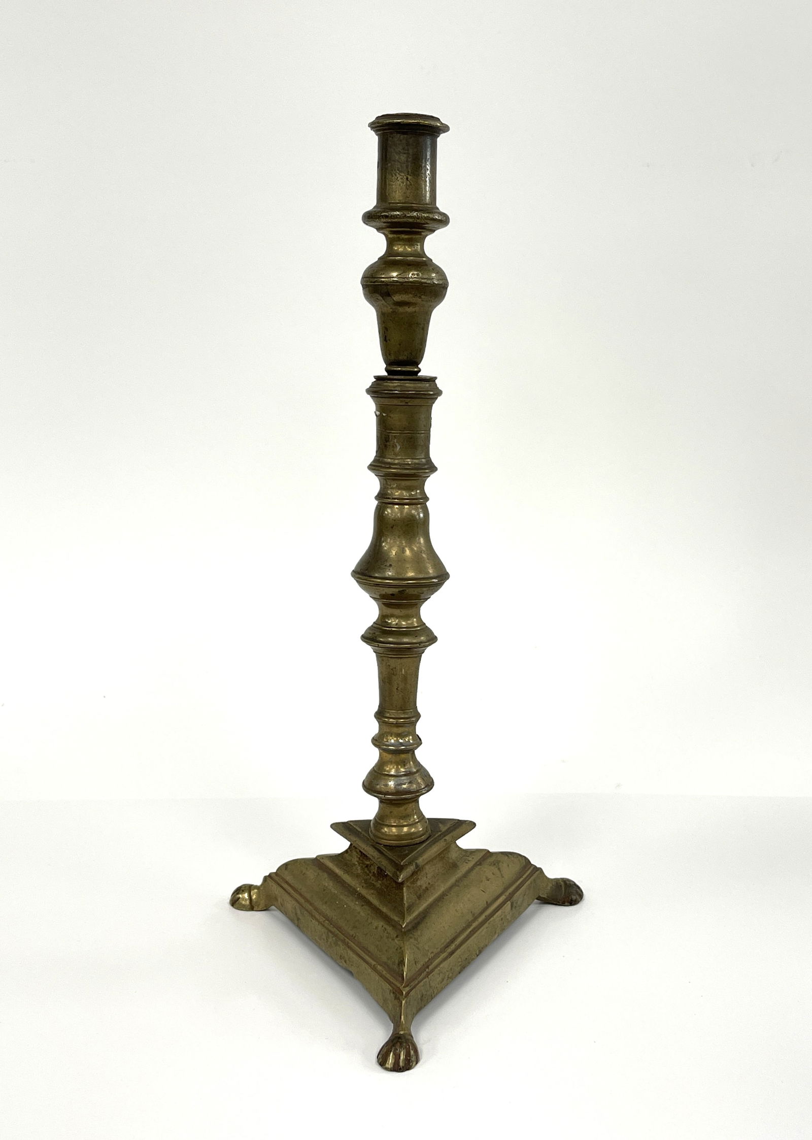 17TH C DUTCH BRASS TALL TRIFID-HOOFED CANDLESTICK (1 of 3)