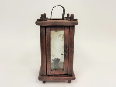 SMALL WOODEN BARN LANTERN IN THE OLD RED