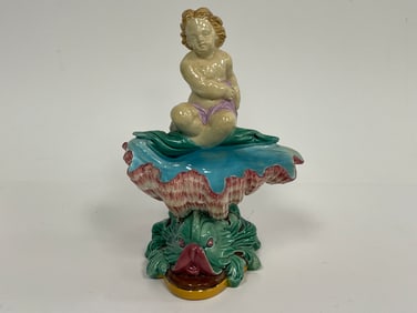 MAJOLICA ; SWEETMEATS SERVER OF PUTTI HOLDING SCALLOP SHELL, WHILE RIDING A FISH , ATT. TO GEORGE