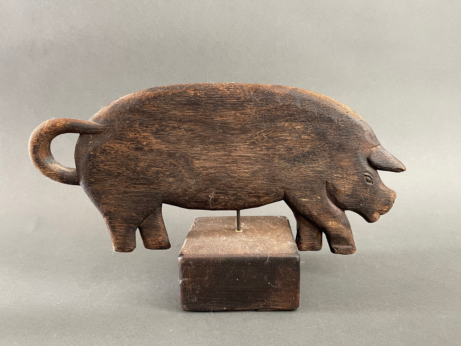 CARVED WOODEN PIG: CARVED WOODEN PIG ON STAND, 17 X 11