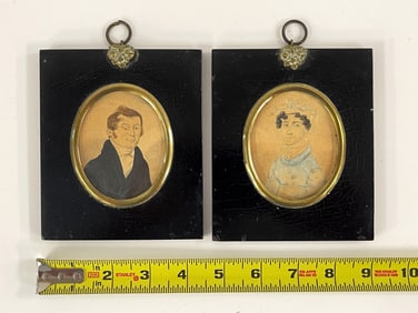 PAIR OF MINIATURE PORTRAITS OF HUSBAND AND WIFE