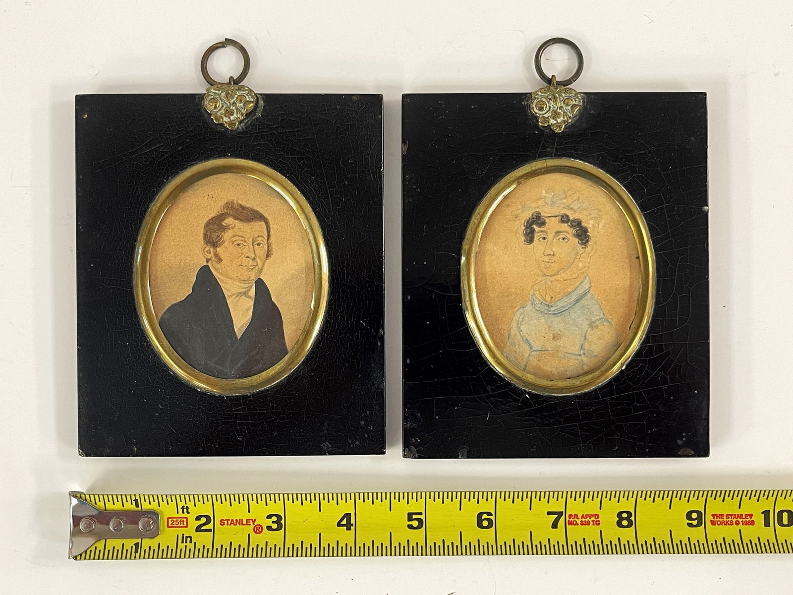 PAIR OF MINIATURE PORTRAITS OF HUSBAND AND WIFE (1 of 2)