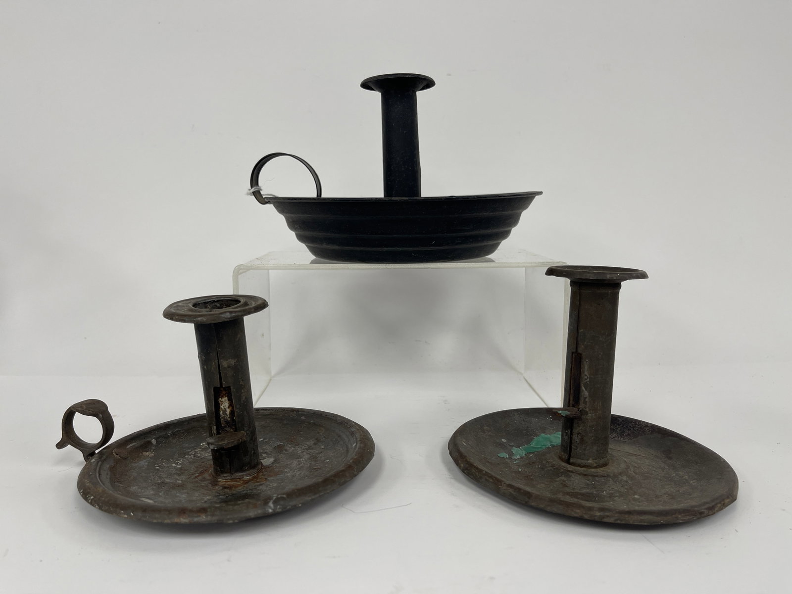 GROUPING OF THREE TIN CANDLE DISHES ALL WITH PUSHUPS: GROUPING OF THREE TIN CANDLE DISHES ALL WITH PUSHUPS 6 X 7