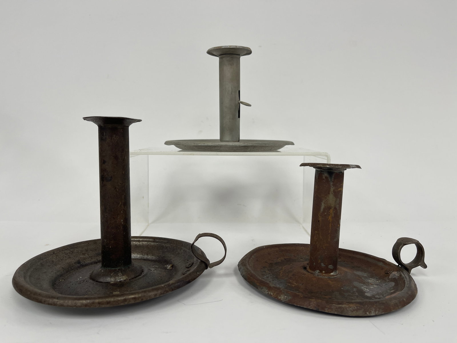 GROUPING OF THREE TIN CANDLE DISHES: GROUPING OF THREE TIN CANDLE DISHES6 X 7
