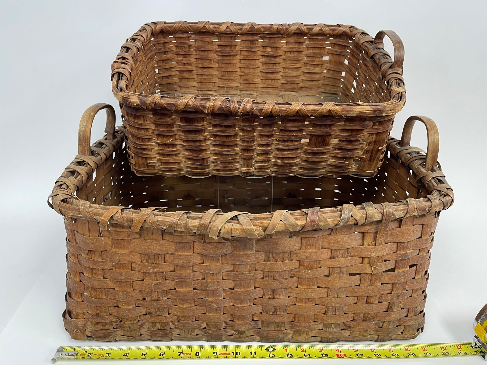 TWO BASKETS ONE WITHOUT HANDLE: TWO BASKETS ONE WITHOUT HANDLE 14" X 18" X 9" , 21" X 15" X 10"