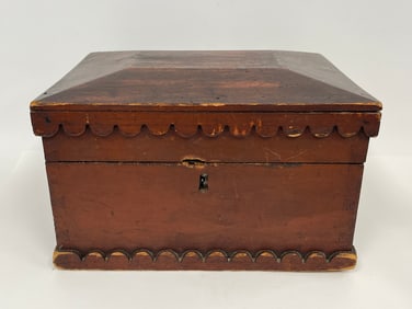 LARGE RED PAINTED CARVED BOX WITH SARCOPHAGUS TOP