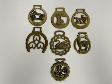 GROUPING OF BRASS HORSE MEDALLIONS