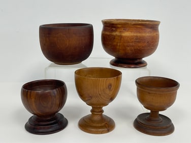 TWO TREEN BOWLS , THREE PEDESTAL CUPS