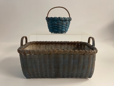 TWO BLUE PAINTED BASKETS
