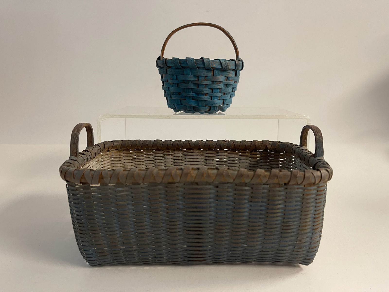 TWO BLUE PAINTED BASKETS (1 of 2)