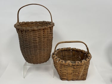 TWO TAGHKANIC BASKETS