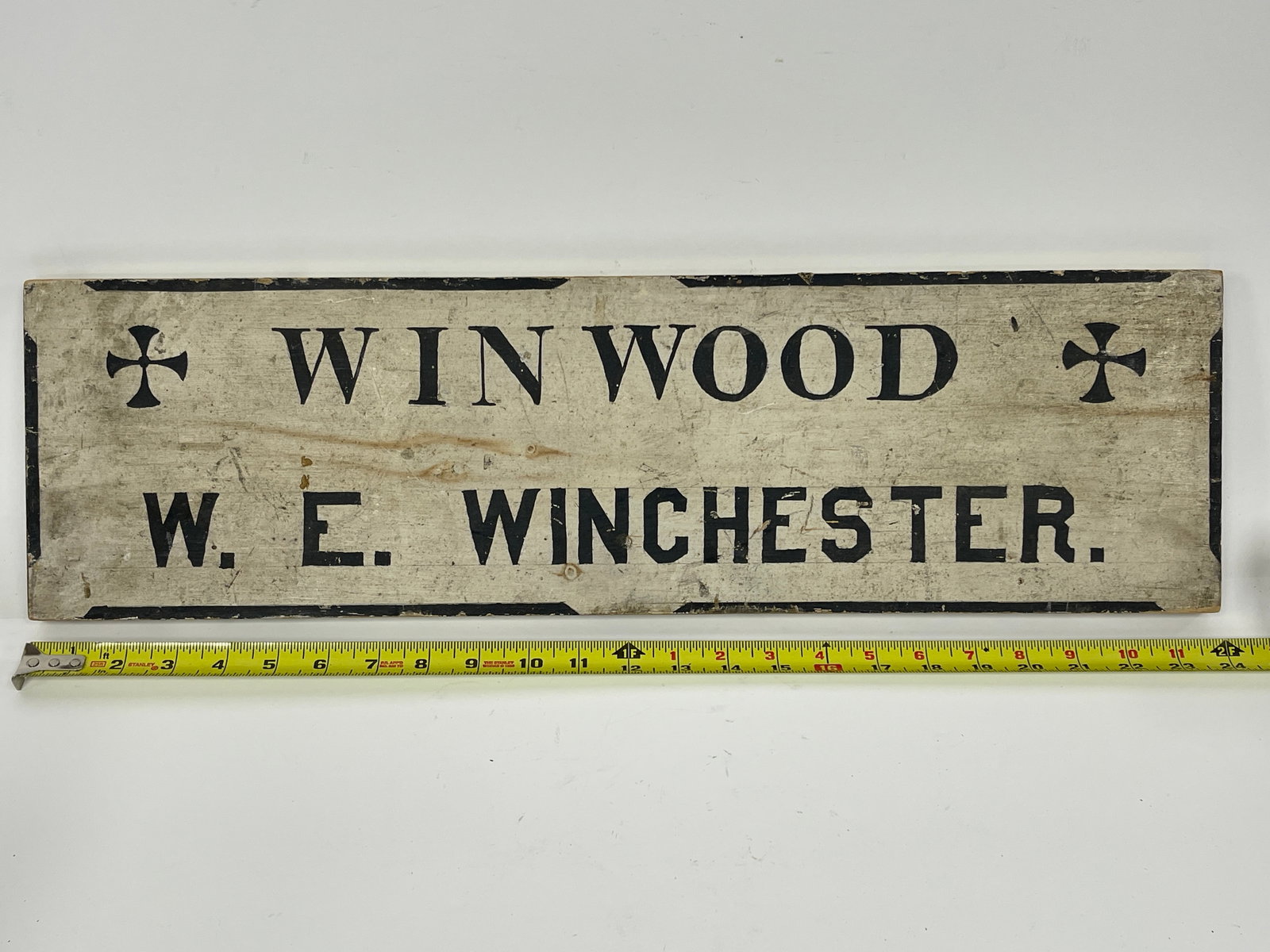 TRADE SIGN SIGNED WINWOOD , WE WINCHESTER: TRADE SIGN SIGNED WINWOOD , WE WINCHESTER 25" X 7"