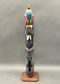 CARVED AND PAINTED TOTEM POLE