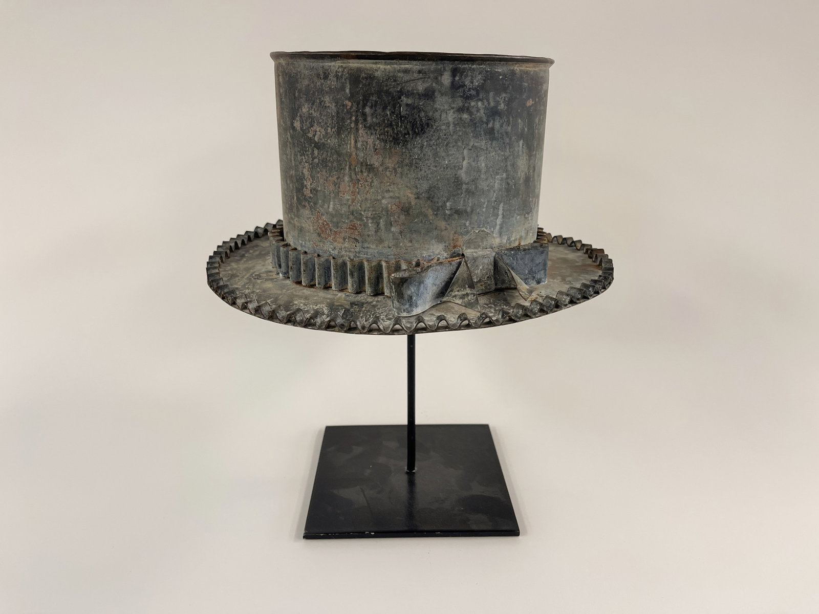 ANNIVERSARY TIN TOP HAT: ANNIVERSARY TIN TOP HAT 19th C, rolled sheet iron, well detailed example, original surface. Excellent condition. Stand included.6 X 11 HAT ONLY