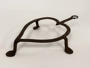 PENNY FOOTED HEART SHAPED FORGED IRON TRIVET W/ RAT TAIL HANDLE