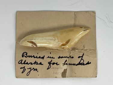 ANCIENT ESKIMO BONE CARVING OF A SEAL