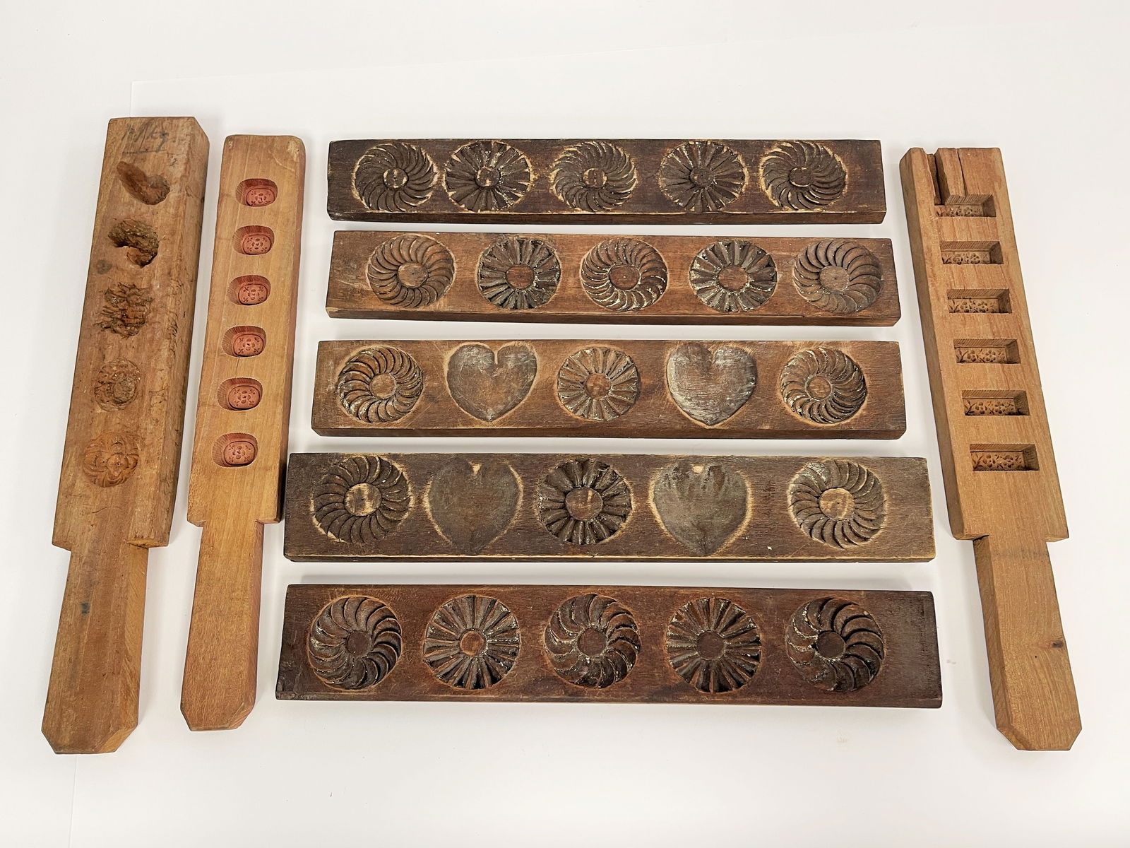 8 CARVED WOODEN MAPLE SUGAR MOULDS (1 of 2)