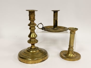 GROUPING OF EARLY BRASS CANDLESTICKS