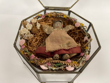 SMALL RUSSIAN DOLL IN STRAW NEST DISPLAYED IN BRASS & GLASS BOX 8" X 8" X 4"