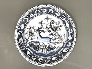 EARLY CONTINENTAL DELFT STYLE PLATE WITH RUNNING STAG