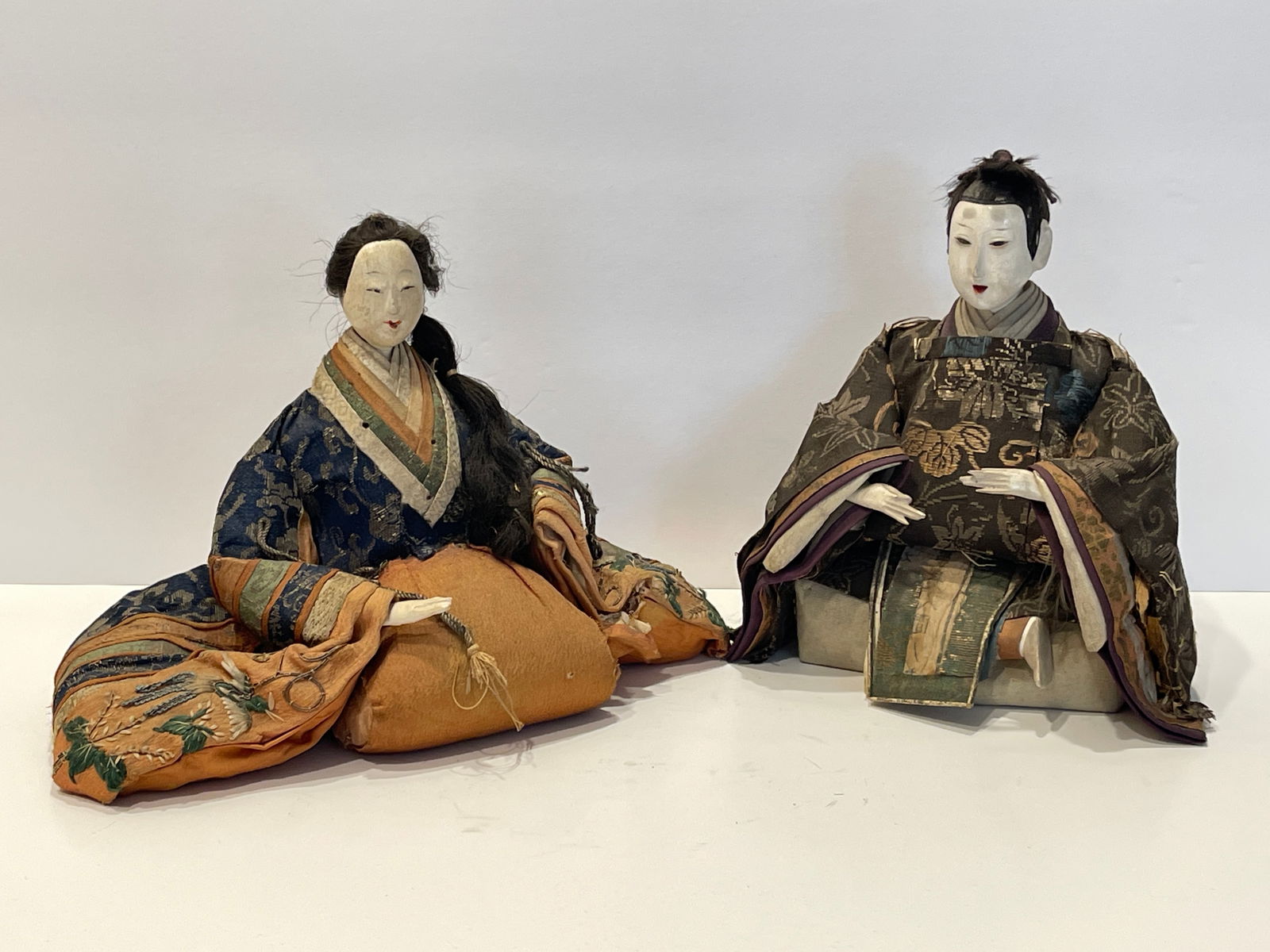 TWO WOODEN HEAD ASIAN DOLLS: TWO WOODEN HEAD ASIAN DOLLS WITH ORIGINAL CLOTHING 7' T