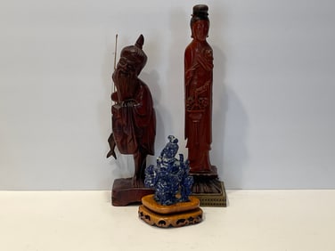 THREE CARVED FIGURES