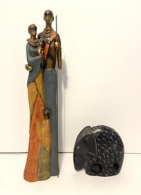 AFRICAN FAMILY AND STONE ELEPHANT