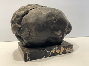 BRONZE BUST OF A SLEEPING BABY