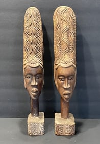 TWO AFRICAN CARVED LADIES